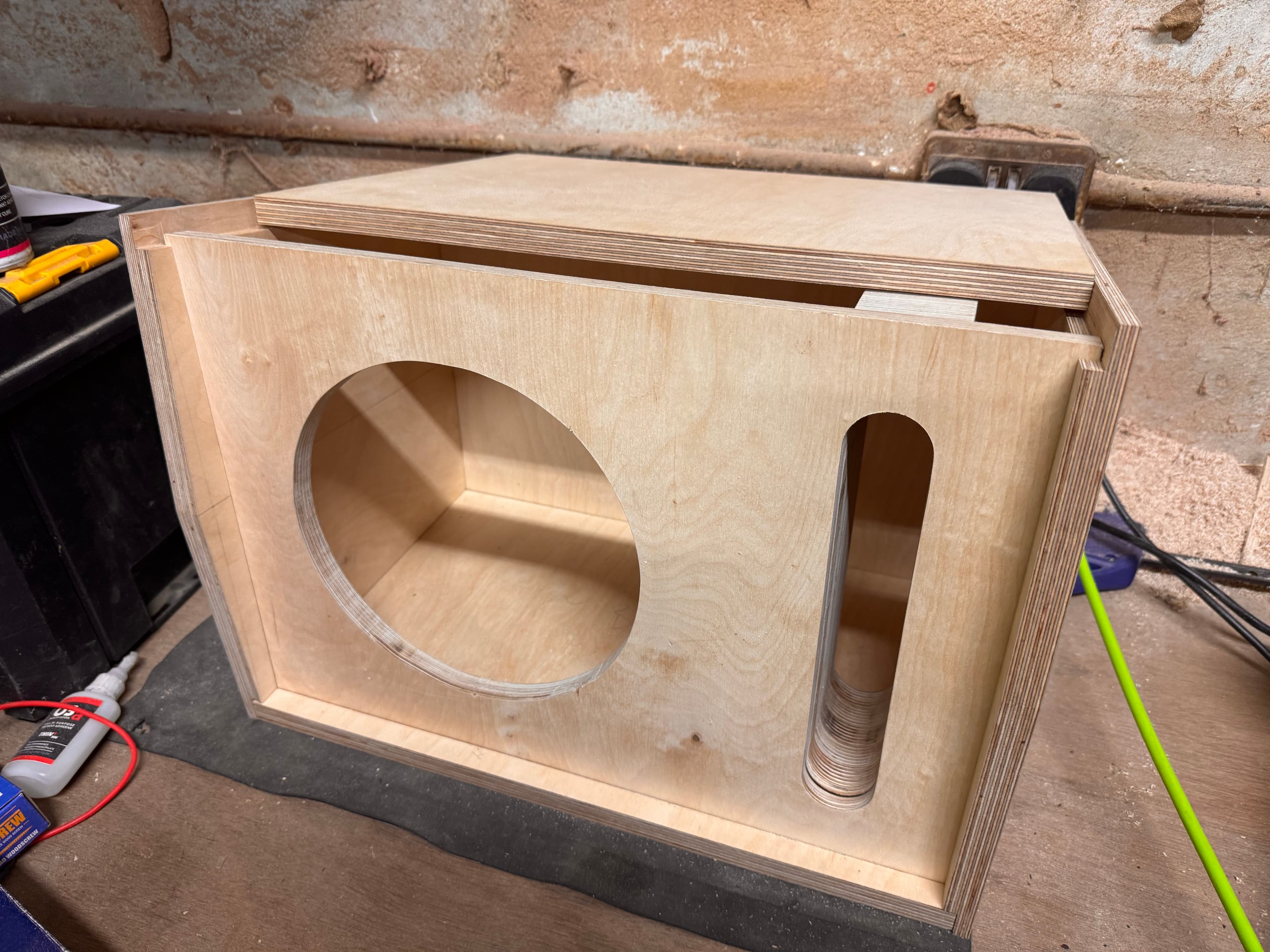 An unfinished birch-ply Darkroom loudspeaker enclosure in the workshop